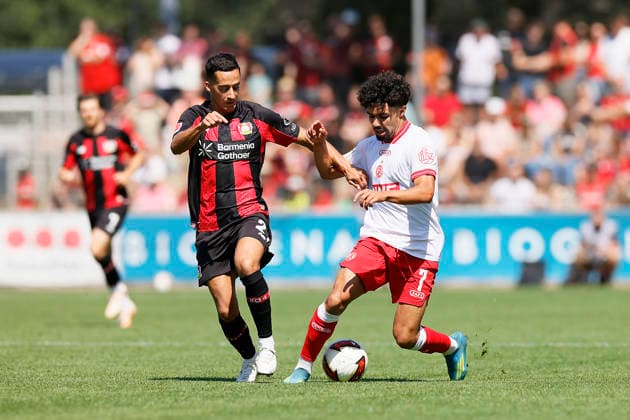 Soccer Friendly Match: Bayer 04 Leverkusen vs. Rot Weiss Essen on August 1, 2026, at Ulrich Haberland Stadium. Lucas Vazquez (Bayer 04 Leverkusen), Aiman Dardari (Rot Weiss Essen)
