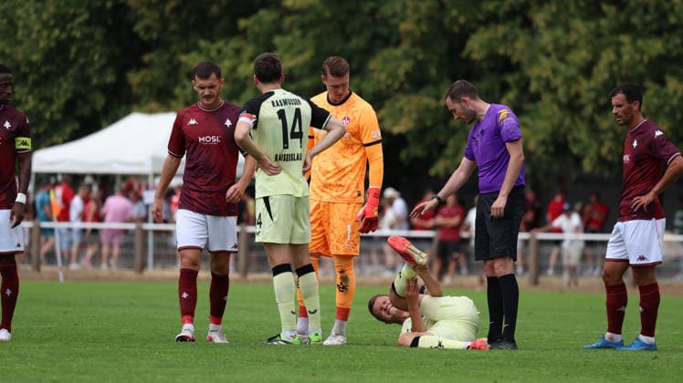 August 1, 2026, xrekx, Soccer Friendly Match, FC Metz 1 FC Kaiserslautern v l Fabian Kunze 1 FC Kaiserslautern injured, injury, pain, pains DFL DFB REGULATIONS PROHIBIT ANY USE OF PHOTOGRAPHS as IMAGE SEQUENCES and or QUASI-VIDEO Metz