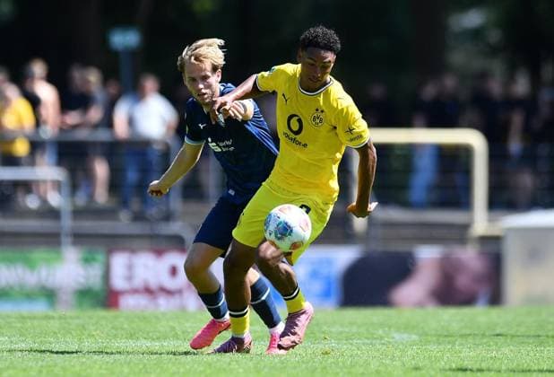 VfL Bochum U21 vs. Borussia Dortmund U23 ** FOR EDITORIAL USE ONLY ** EDITORIAL USE ONLY ** p Soccer Regionalliga West 1 Matchday VfL Bochum U21 vs. Borussia Dortmund U23 on August 1, 2026, at the Mondpalast Arena in Herne Benedikt Samuel Lutz Wüstenhagen Borussia Dortmund U23, in the foreground: Lars Holtkamp (VfL Bochum U21), in the background: Germany, North Rhine-Westphalia, Herne. Copyright ThorstenxTillmann Copyright: ThorstenxTillmann doc86yy6gidx601f4rp9eca ,EDITORIAL USE ONLY Copyright: ThorstenxTillmann