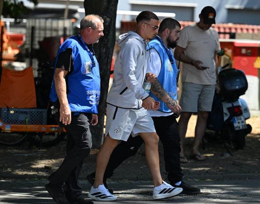 August 1, 2026, xophax, Soccer, Bundesliga 1, 1. FC Köln Season opener at 1. FC Köln’s Rhein Energie Stadium; fans line up for an autograph from Said El Mala; Said El Mala has to be escorted across the grounds by security and guards; Cologne