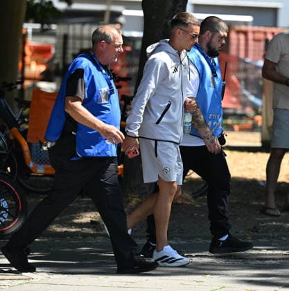 August 1, 2026, xophax, Soccer, Bundesliga 1, 1. FC Köln Season opener at 1. FC Köln’s Rhein Energie Stadium; fans line up for an autograph from Said El Mala; Said El Mala has to be escorted across the grounds by security and guards; Cologne