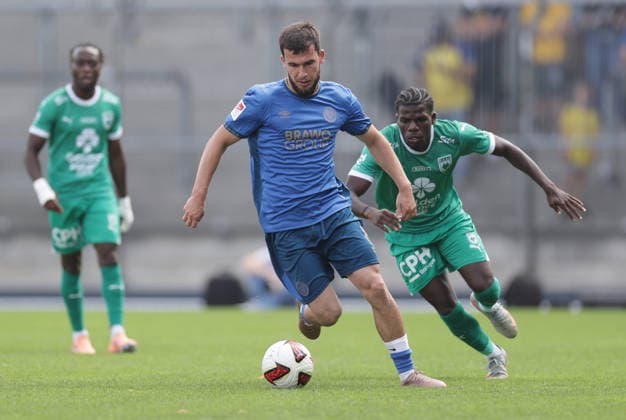 From left: Mehmet Aydin (Eintracht Braunschweig), Nachon Nsingi (La Louviere) – Soccer, Men s, 2026–2027 Season, 2nd Bundesliga, Eintracht Stadium, Eintracht Braunschweig vs. RAAL La Louvière, preseason, friendly match, 0–0. DFL regulations prohibit any use of photographs as image sequences and or quasi-video.
