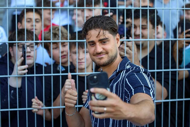 August 1, 2026, GER, Soccer, Men s, Friendly Match, 2026–2027 Season, KFC Uerdingen Delay Sports President Elias Eli Nerlich takes a photo with a fan at Krefeld Grotenburg Stadium, North Rhine-Westphalia, Germany Copyright: xAdrianxSchlüterx
