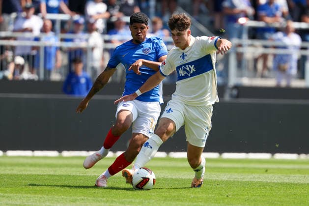 August 1, 2026, Darmstadt, Friendly Match: SV Darmstadt 98 vs. FC Portsmouth; from left: Luke Le Roux (Portsmouth), Noah Raphael Weißhaupt (SV Darmstadt 98) battle for the ball Copyright: HMBxMedia JoaquimxFerreira