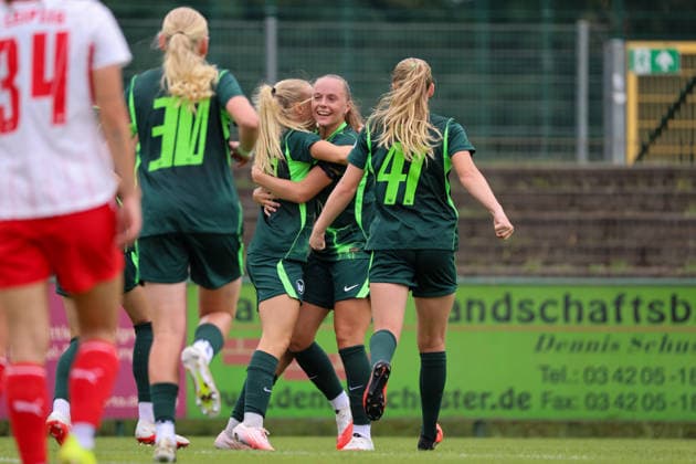 Markranstädt, Germany, August 1, 2026: Friendly match between RB Leipzig Women and VfL Wolfsburg Women. Pictured, from left: Lou Bogaert (Wolfsburg), the third goal scorer, celebrates with Anny Kerim Lindland (Wolfsburg) and Linnea Saelen (Wolfsburg) after scoring the goal that made it 3–0 for Wolfsburg. Copyright: HMBxMedia MadeleinexFantini