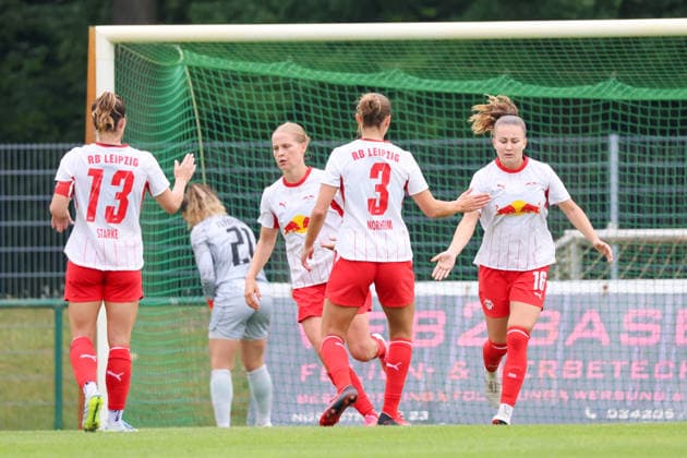 Markranstädt, Germany, August 1, 2026: Friendly match between RB Leipzig Women and VfL Wolfsburg Women. Pictured: Goal scorer Annabel Schasching (RB), on the right, converts the penalty kick to make it 1–3 for Leipzig and high-fives Andrea Norheim (RB). Copyright: HMBxMedia MadeleinexFantini