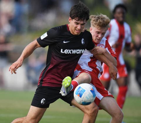 August 1, 2026, xophax, Soccer, DFB Cup U19, A Juniors, A Youth, 1st Round: Fortuna Cologne vs. SC Freiburg—Yanik Boos (SC Freiburg, left) and Adrian Carlo Meier Wagner (SC Fortuna Cologne, right)