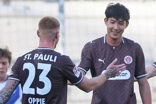 Taichi Hara of FC St. Pauli celebrates after scoring his team s first goal against Louis Oppie of FC St. Pauli during the preseason friendly match between FC St. Pauli and RC Deportivo La Coruna at Millerntor Stadium on August 1, 2026, in Hamburg, Germany. Photo by Marco Steinbrenner, DeFodi Images