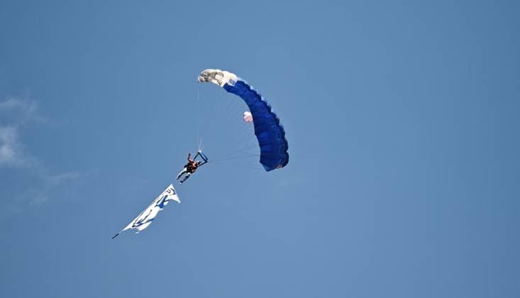 August 1, 2026 xkhx Kassel Regional League Southwest 2026–2027 Season Bundesliga Friendly Match KSV Hessen Kassel vs. FC Schalke 04: The Schalke flag is carried into the stadium on a blue-and-white paraglider