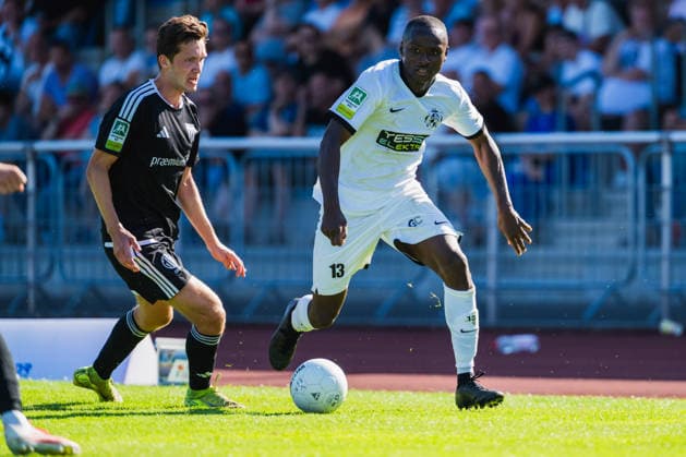 Lennart Garlipp (1 FC Bocholt, No. 15) in a tackle with the attacking Mohamed Cisse (VFB Hilden, No. 13); VFB Hilden vs. 1 FC Bocholt, soccer, Regionalliga West, Matchday 1, 2026–27 season, August 1, 2026, VFB Hilden vs. 1 FC Bocholt, soccer, Regionalliga West, Matchday 1, 2026–27 season, August 1, 2026, Hilden Copyright: xEibner-Pressefoto LukasxBaldygax EP_LBA