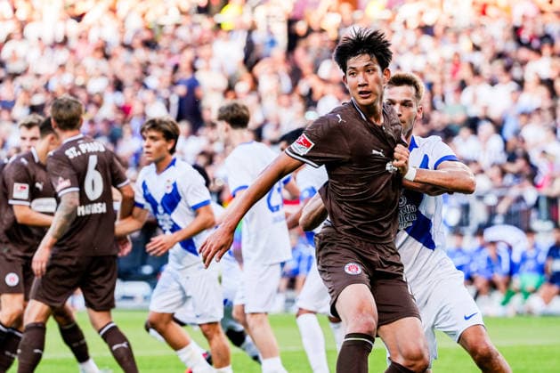 Germany Soccer 2. Bundesliga 2026–27, Preseason Match: FC St. Pauli vs. Deportivo de A Coruna, Millerntor Stadium, Hamburg; Taichi Hara of FC St. Pauli, No. 18, in a tackle inside the penalty area Copyright: xStefanxTrochax