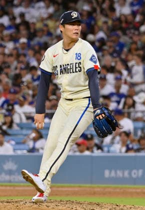 Los Angeles Dodgers starting pitcher Yoshinobu Yamamoto winds up to deliver in the eighth inning at Dodger Stadium in Los Angeles on Saturday, August 1, 2026.  LAP2026080112 JIMxRUYMEN