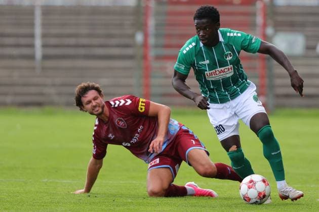 August 26, 2001, Germany, Regionalliga Nord, Soccer, Matchday 1, 2026–2027 Season, Dietmar Scholze Stadium an der Lohmuehle, VfB Lübeck vs. SC Weiche Flensburg Alexander Laukart (SC Weiche Flensburg) on August 7 in a tackle against Emmanuel Appiah (VfB Lübeck) 18 Photo: nordphoto GmbH Tauchnitz, Lübeck, Dietmar Scholze Stadium an der Lohmühle, SH, Germany Copyright: xnordphotoxGmbHx xTauchnitzx