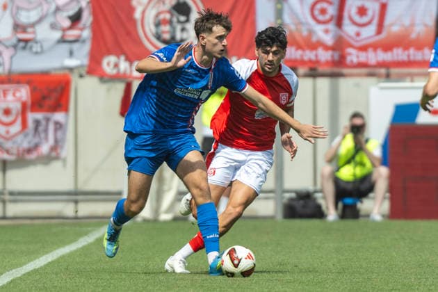 Regionalliga Northeast, Season 26–27: Hallescher FC vs. FC Rot Weiss Erfurt, Halle, Germany, August 2, 2026. Pictured from left: Benjamin Dreca and Burim Halili. Halle, Halle-Saale, Leuna Chemie Stadium, Saxony-Anhalt, Germany
