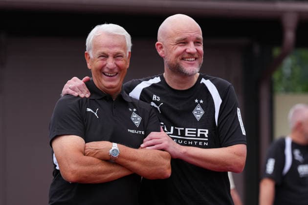 August 2, 2026, xydrx, soccer, training camp, Borussia Mönchengladbach, 2026–2027 season, Birkenmoos Stadium: Rainer Bonhof, President of Borussia Mönchengladbach, laughing with Rouven Schroeder, Sporting Director of Borussia Mönchengladbach. DFB regulations prohibit any use of photographs as image sequences and or quasi-video. Copyright: HMBxMedia YannisxDreimann