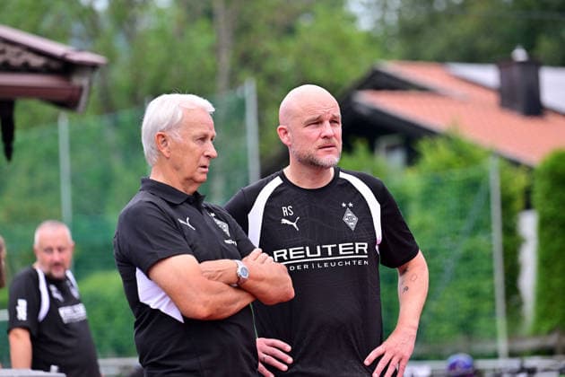August 2, 2026 Rottach Egern Soccer, Men s, 2026–2027 season, Borussia Mönchengladbach training camp. In conversation (from left): Rainer Bonhof, President of Gladbach; Rouven Schröder, Head of Sports, Gladbach. DFL regulations prohibit any use of photographs as image sequences and or quasi-video. Am Birkenmoos Stadium, Bavaria, Germany