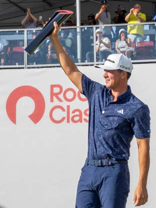 DETROIT, MI - AUGUST 02: Michael Thorbjornsen (USA) receives the Rocket Classic Trophy after the final round of the Rocket Classic at Detroit Golf Club on August 02, 2026, in Detroit, Michigan. (Photo by Joseph Weiser Icon Sportswire) GOLF: AUG 02 PGA, Golf Herren Rocket Classic EDITORIAL USE ONLY Icon260802085