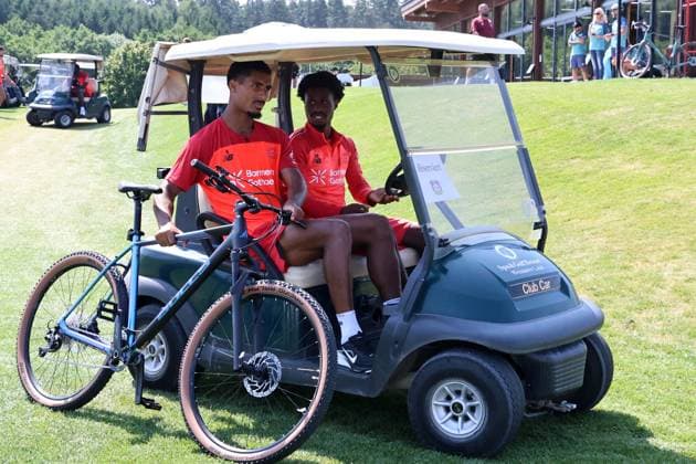 GER, Bayer 04 Leverkusen Training Camp in Blankenhain, August 3, 2026, Blankenhain, GER, 2026–2027 Season, 1. Bundesliga, Bayer 04 Leverkusen Training Camp in Pictures: Loic Bade and Nathan Tella with the golf caddy and bicycle. DFL regulations prohibit any use of photographs as image sequences and or quasi-video.
