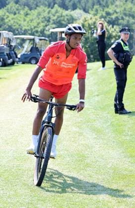 GER, Bayer 04 Leverkusen Training Camp in Blankenhain, August 3, 2026, Blankenhain, GER, 2026–2027 Season, Bundesliga 1, Bayer 04 Leverkusen Training Camp in Pictures: Jeanuel Belocian on a Bicycle. DFL regulations prohibit any use of photographs as image sequences and or quasi-video.