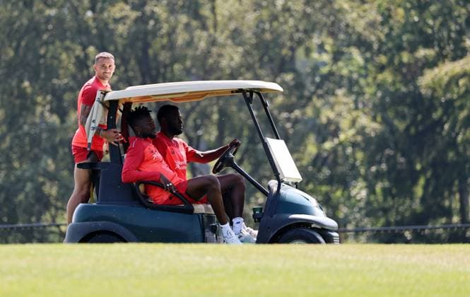 GER, Bayer 04 Leverkusen Training Camp in Blankenhain, August 3, 2026, Blankenhain, GER, 2026–2027 Season, Bundesliga 1, Bayer 04 Leverkusen Training Camp in Pictures: Edmond Tapsoba and Victor Boniface with the golf caddy; Aleix Garcia as the passenger. DFL regulations prohibit any use of photographs as image sequences and or quasi-video.