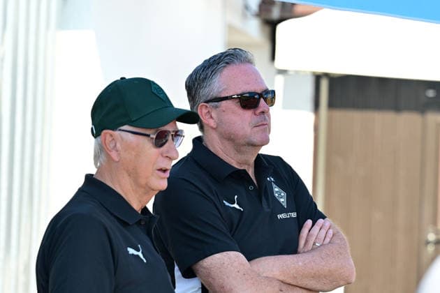 August 4, 2026 Rottach Egern Soccer, Men s, 2026–2027 season, Borussia Mönchengladbach training camp. In conversation (from left): Rainer Bonhof, President of Gladbach; Markus Aretz, Managing Director of Gladbach. DFL regulations prohibit any use of photographs as image sequences and or quasi-video. Am Birkenmoos Stadium, Bavaria, Germany