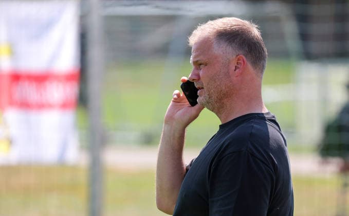 August 4, 2026, Germany, Grassau, Bundesliga, 2026–2027 season, VfB Stuttgart training camp, Fabian Wohlgemuth, Director of Sports, on the phone