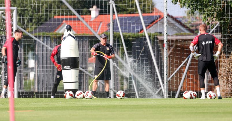 August 4, 2026, Germany, Grassau, Bundesliga, 2026–2027 season, VfB Stuttgart training camp, goalkeeper coach Kai Rabe waters the field