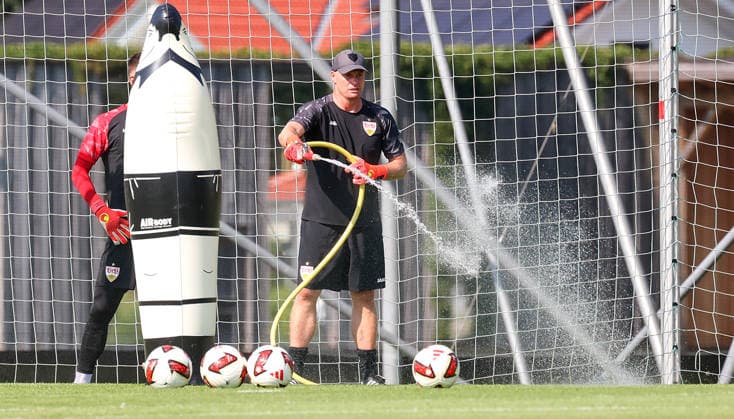 August 4, 2026, Germany, Grassau, Bundesliga, 2026–2027 season, VfB Stuttgart training camp, goalkeeper coach Kai Rabe waters the field