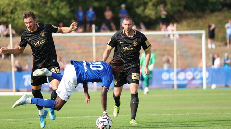 August 4, 2026, xrekx, Soccer Friendly Match, SV Elversberg vs. Racing Strasbourg: Lukas Petkov (SV 07 Elversberg), Martial Godo (Racing Strasbourg), Luca Sirch (SV 07 Elversberg) – Tackle, Action, battle for the ball. DFL and DFB regulations prohibit any use of photographs as image sequences and or quasi-video. Haguenau
