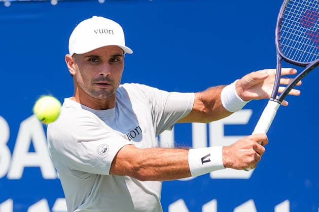 MONTREAL, QC - AUGUST 04: Marcos Giron (USA) returns the ball during a first round match at National Bank Open on August 04, 2026 at IGA Stadium in Montreal, QC (Photo by David Kirouac Icon Sportswire) TENNIS: AUG 04 National Bank Open EDITORIAL USE ONLY Icon26080400926