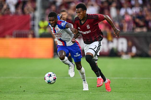 From left Clinton Mata of Lyon and Josimar Alcocer of Sparta in action during the 1st leg, 3rd qualifying round match of the Football Champions League between Sparta Praha and Olympique Lyon, on August 4, 2026, in Prague, Czech Republic. (CTKxPhoto OndrejxDeml) CTKPhotoP2026080406523  CTKPhotoP2026080406523