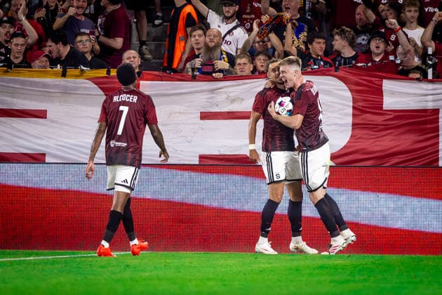 SPARTA PRAGUE - OLYMPIQUE LYONNAIS Matej Rynes, Adam Karabec, Josimar Alcocer of Sparta celebrate a goal during the first leg of third qualifying round of UEFA Champions league football match between AC Sparta Praha and Olympique Lyonnais at the Epet arena Stadium Letna. Prague, Czechia, August 04, 2026. Photo by Branislav Racko Copyright: xx 080A5901