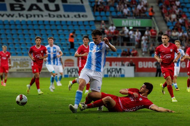 August 4, 2026, GER, Regionalliga Nord Ost, Matchday 3, 2026–2027 Season, Chemnitz, Chemnitzer FC vs. FSV Zwickau; David Vogt (Chemnitzer FC, No. 11) in a tackle against Andrey Startsev (FSV Zwickau, No. 15); Chemnitz Eins Stadium, An der Gellertstraße, Saxony, Germany Copyright: xnordphotoxGmbHx xTrienitzx