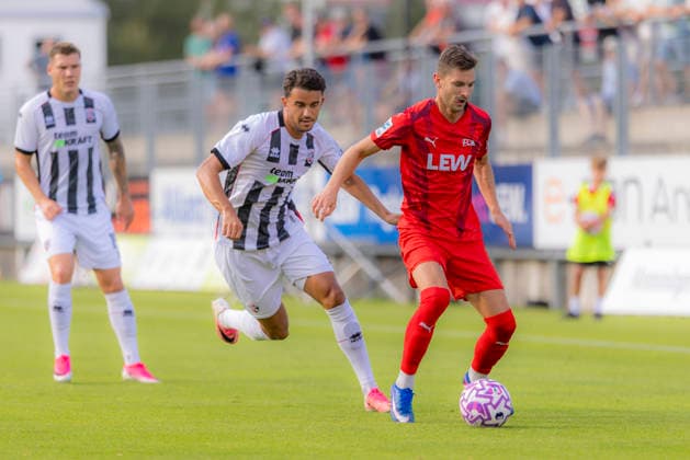 Memmingen, Germany, August 3, 2026 — Toto Cup, Bavarian State Cup 2026–2027, Round 2: FC Memmingen vs. FC Ingolstadt 04. Pictured, from left, in a tackle: Frederik Carlsen (FCI) and Fabian Lutz (FCM), at ArenaPark Bayern Copyright: xFotostandx xSchäferx