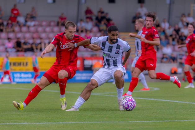 Memmingen, Germany, August 3, 2026 — Toto Cup, Bavarian State Cup 2026–2027, Round 2: FC Memmingen vs. FC Ingolstadt 04. Pictured, from left, in a tackle: Max Zeller (FCM) and Keanan Bennetts (FCI) at ArenaPark Bayern. Copyright: xFotostandx xSchäferx