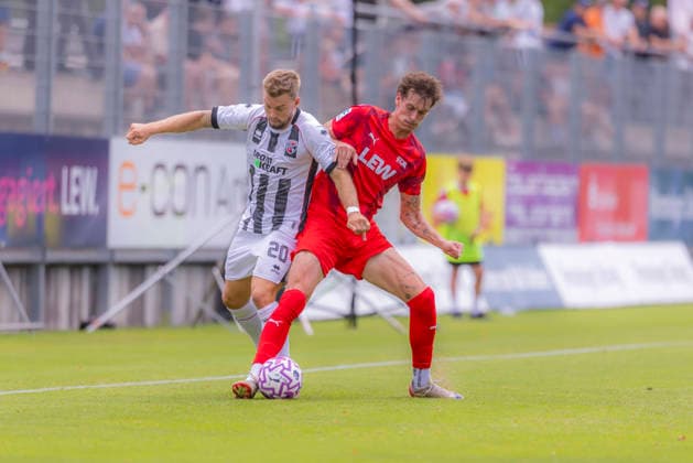 Memmingen, Germany, August 3, 2026, Toto Cup, Bavarian State Cup 2026–2027, Round 2, FC Memmingen vs. FC Ingolstadt 04. Pictured from left, in a tackle: Yannick Deichmann (FCI) and Luis Pfaumann (FCM), at ArenaPark Bayern Copyright: xFotostandx xSchäferx