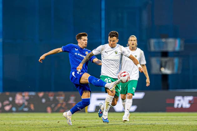 GNK Dinamo vs FK Kauno Žalgiris, UEFA Champions League third qualifying round, first leg, Stadion Maksimir, August 4, Zagreb, Croatia. Miha Zajc challenges Franco Baldassarra during the UEFA Champions League third qualifying round first leg match between GNK Dinamo and FK Kauno Žalgiris at Stadion Maksimir in Zagreb, Croatia. Zagreb Zagreb Croatia