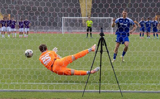 Penalty shootout: Elias Rogg, goalkeeper for TSV Schwaben Augsburg, makes a save against Elidon Qenaj of FVI TSV Schwaben Augsburg vs. FV Illertissen, Toto Cup