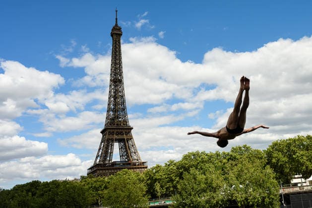 An athlete trains in the high diving, with the Eiffel Tower on the background, during the European Aquatics Championships at the River Seine in Paris (France), August 5, 2026. Andrea Staccioli Deepbluemedia Insidefoto