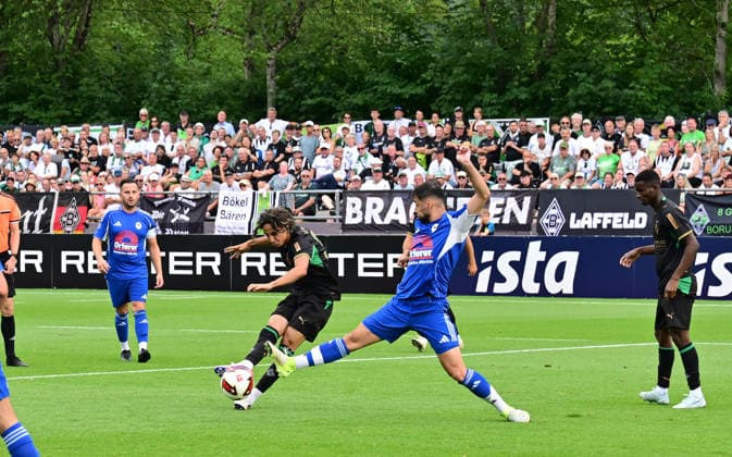 August 5, 2026 Rottach Egern Soccer, Men s, 2026–2027 season, Friendly Match: FC Rottach Egern vs. Borussia Mönchengladbach; Wael Mohya (Gladbach), center-left, takes a shot and scores to make it 0–1. DFL regulations prohibit any use of photographs as image sequences and or quasi-video. Am Birkenmoos Stadium, Bavaria, Germany