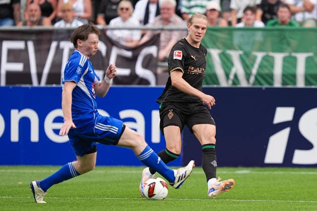 August 5, 2026, xydrx, Soccer, Friendly Match, FC Rottach Egern vs. Borussia Mönchengladbach, 2026–2027 Season, Birkenmoos Stadium, Gabriel Kiekenbeck, FC Rottach Egern, No. 6 in a tackle against David Herold, Borussia Mönchengladbach, 20. DFB regulations prohibit any use of photographs as image sequences and or quasi-video. Copyright: HMBxMedia YannisxDreimann