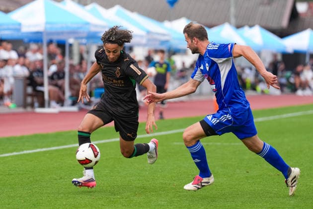 August 5, 2026, xydrx, Soccer, Friendly Match, FC Rottach Egern vs. Borussia Mönchengladbach, 2026–2027 Season, Birkenmoos Stadium, Wael Mohya (Borussia Mönchengladbach), No. 36 in a tackle against Florian Mex (FC Rottach Egern), 9. DFB regulations prohibit any use of photographs as image sequences and or quasi-video Copyright: HMBxMedia YannisxDreimann