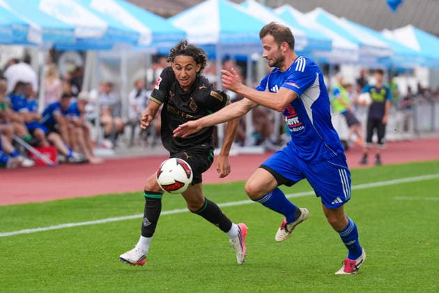 August 5, 2026, xydrx, Soccer, Friendly Match, FC Rottach Egern vs. Borussia Mönchengladbach, 2026–2027 Season, Birkenmoos Stadium, Wael Mohya (Borussia Mönchengladbach), No. 36 in a tackle against Florian Mex (FC Rottach Egern), 9. DFB regulations prohibit any use of photographs as image sequences and or quasi-video Copyright: HMBxMedia YannisxDreimann