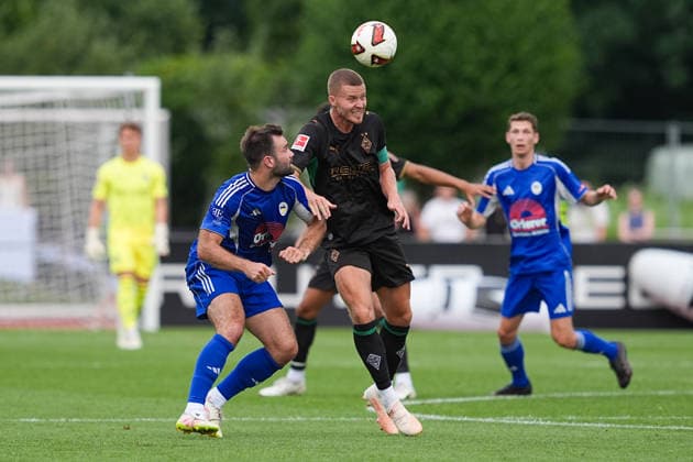 August 5, 2026, xydrx, soccer, exhibition match, FC Rottach Egern vs. Borussia Mönchengladbach, 2026–2027 season, Birkenmoos Stadium, Julian Wiefarn, FC Rottach Egern, No. 5 in a tackle against Nico Elvedi, Borussia Mönchengladbach, 30. DFB regulations prohibit any use of photographs as image sequences and or quasi-video. Copyright: HMBxMedia YannisxDreimann
