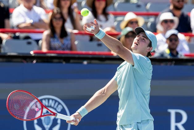 August 5, 2026, Montreal, Quebec, Canada: JOAO FONSECA (22) from Brazil serving in match against Stefanos Tsitsipas from Greece in second round at Canadian Open at IGA stadium in Montreal, Quebec, Canada on 2026-08-05 Montreal Canada - ZUMAl189 20260805_zsp_l189_019 Copyright: xYannickxLegarex