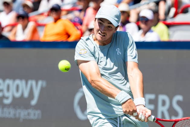August 5, 2026, Montreal, Quebec, Canada: JOAO FONSECA (22) from Brazil backhand in match against Stefanos Tsitsipas from Greece in second round at Canadian Open at IGA stadium in Montreal, Quebec, Canada on 2026-08-05 Montreal Canada - ZUMAl189 20260805_zsp_l189_032 Copyright: xYannickxLegarex