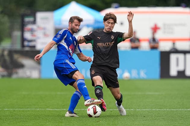 August 5, 2026, xydrx, Soccer, Friendly Match, FC Rottach Egern vs. Borussia Mönchengladbach, 2026–2027 Season, Birkenmoos Stadium, Florian Mex (FC Rottach Egern), No. 9 in a tackle against Daiki Hashioka (Borussia Mönchengladbach), No. 14. DFB regulations prohibit any use of photographs as image sequences and or quasi-video. Copyright: HMBxMedia YannisxDreimann