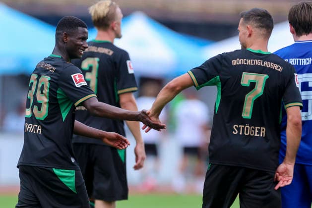 Iaia Manco Danfa of Borussia Mönchengladbach and Kevin Stoeger of Borussia Mönchengladbach celebrate during the friendly match between FC Rottach Egern and Borussia Mönchengladbach at Birkenmoos Stadium on August 5, 2026, in Rottach Egern, Germany Photo by Marco Steinbrenner DeFodi Images Iaia Manco Danfa of Borussia Mönchengladbach and Kevin Stoeger of Borussia Mönchengladbach cheer during the friendly match between FC Rottach Egern and Borussia Mönchengladbach at Stadion Birkenmoos on August 5, 2026 in Rottach Egern, Germany Photo by Marco Steinbrenner, DeFodi Images Photo by Marco Steinbrenner, DeFodi Images