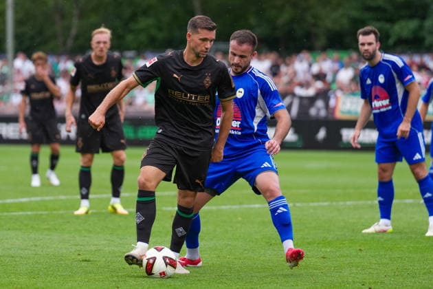 August 5, 2026, xydrx, Soccer, Friendly Match, FC Rottach Egern vs. Borussia Mönchengladbach, 2026–2027 Season, Birkenmoos Stadium, Kevin Stoeger, Borussia Mönchengladbach, No. 7 in a tackle against Fethi Sourtsoglou of FC Rottach Egern, No. 10. DFB regulations prohibit any use of photographs as image sequences and or quasi-video. Copyright: HMBxMedia YannisxDreimann
