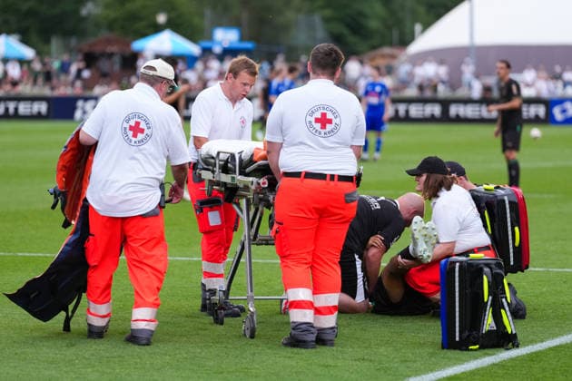 August 5, 2026, xydrx, soccer, friendly match, FC Rottach Egern vs. Borussia Mönchengladbach, 2026–2027 season, Birkenmoos Stadium, Jens Castrop, Borussia Mönchengladbach, No. 17 is injured and carried off the field on a stretcher. DFB regulations prohibit any use of photographs as image sequences and or quasi-video. Copyright: HMBxMedia YannisxDreimann